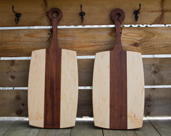 Handmade walnut/birdseye factory maple paddle style cutting boards